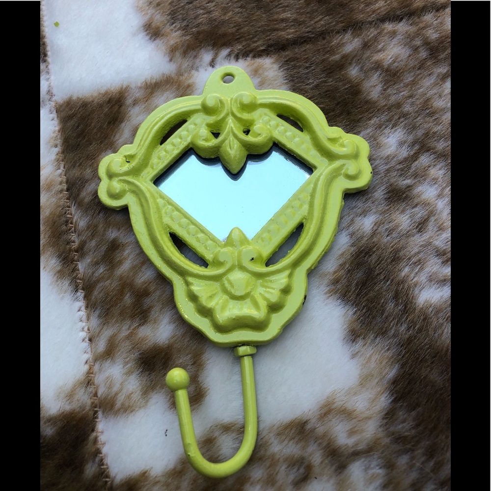 Yellow/green cast iron hook